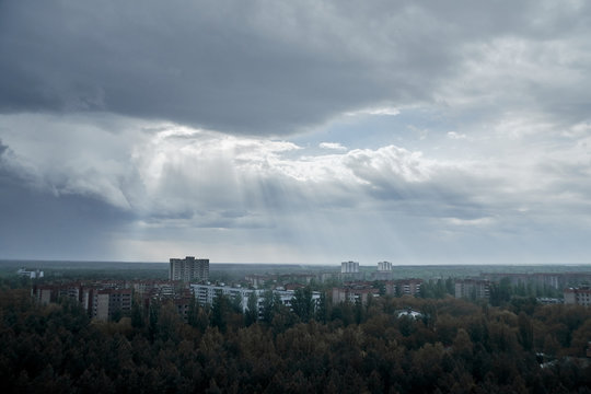 Pripyat city in the rain from the roof of a multi-storey building