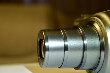 fully zoomed zoom lens in silver metal housing