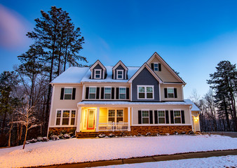 Beautiful American luxury home on a snowy morning - 325858653