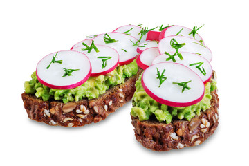 Radish avocado dill rye sandwiches on a white isolated background