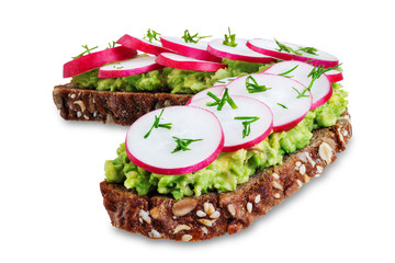 Radish avocado dill rye sandwiches on a white isolated background