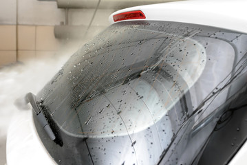 The Surface Protection of the car windows at the car wash under the jets of water