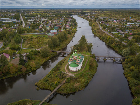 Aerial view of Smolensky Cathedral of Olonets located on a small island Mariam, lying below the confluence of the rivers Olonka and Megregi in Karelia, Russia.