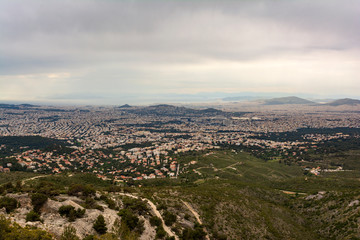 Panoramic view of cloudy Athens, taken shot from Penteli mountain