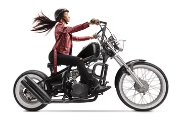 Papier Peint photo Moto Young woman riding a custom black motorcycle