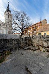 Obraz premium Ruins of Memi Pasa's Bath with the Francisan Church in the background in Pecs