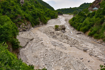 Mountain river on the way to the ancient center of handicraft production of copper utensils Lahich