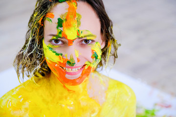 Living painting - an animated portrait. Portrait of a smiling girl with acrylic painting