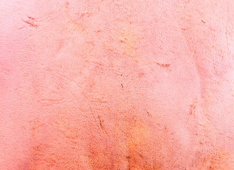 Painted rough leather.