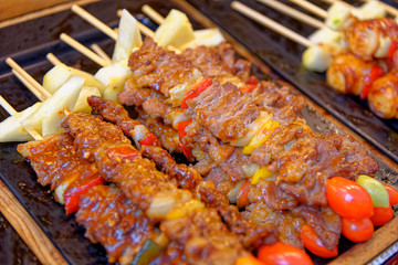 Grilled meat on sticks