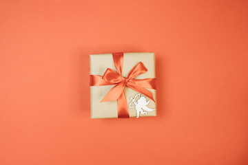 gift on red background with bow