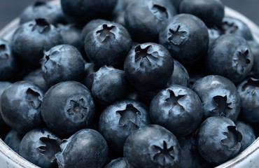 Fresh blueberries close-up. Berry background. Blue ripe berries, macro. The summer harvest