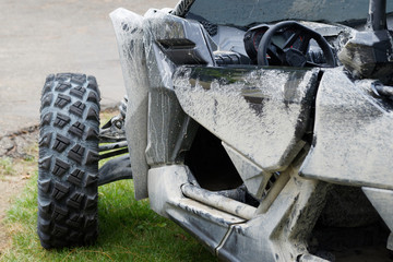 Close-up. Dirty Cockpit ATV UTV buggy. © Andrei
