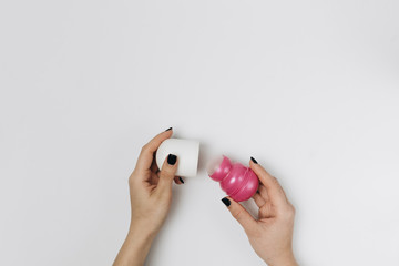 Roll-on deodorant with a pink lid open 