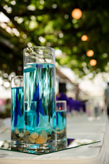 beautiful blue floating candle wedding centerpiece