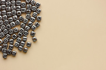 Abstract background with letter cubes. Empty space for text.