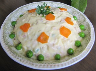 Salad of cooked vegetables and mayonnaise