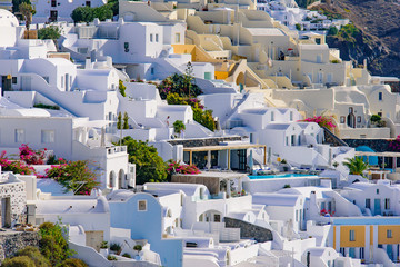 Traditional white buildings facing Aegean Sea in Oia, Santorini island, Greece