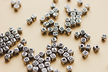 Abstract background with letter cubes. Empty space for text.