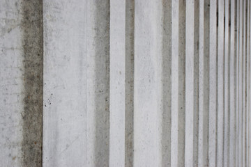 Abstract vertical lines on tilt slab concrete building