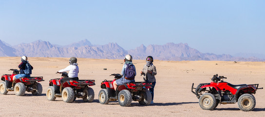 Tours of the desert on Quad bikes. ATV safaris. A vehicle for racing in the Sahara.