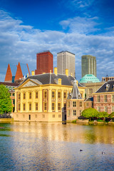 Binnenhof Palace of Parliament inThe Hague in The Netherlands At Daytime. Against Modern Skyscrapers.