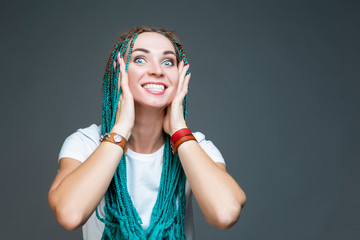 Portrait of Young Caucasian Female With Green African American Dreadlocks and Casual  Clothing...