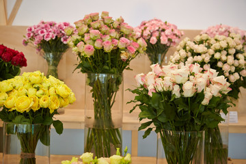 Blooming flowers in glass vase 