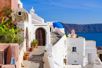 Traditional white buildings facing Aegean Sea in Oia, Santorini island, Greece