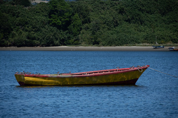 Naklejka na ściany i meble Wooden typical fishing boat at Chiloe, Chile