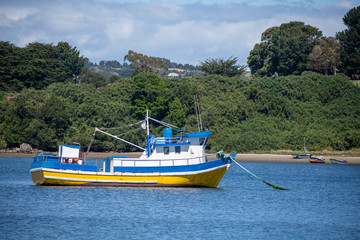 Fototapeta na wymiar fishing boat on a bay at Chiloé Chile