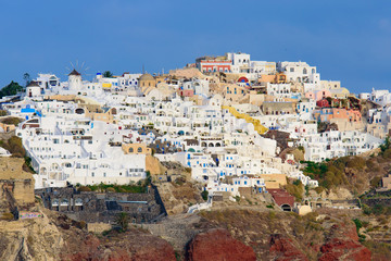 View of the white buildings of Oia village from Aegean Sea, Santorini, Greece