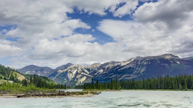 Time lapse of Colin Range Mountains from banks of the Athabasca River, near Jasper townsite, Jasper National Park, Alberta, Canada