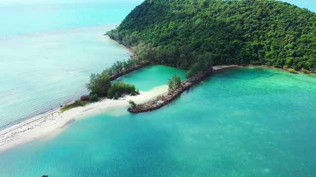 Ko Tae Nai, Koh Phangan, Thailand. Small tropical cay with natural pool and sandbank covered with tropical trees.