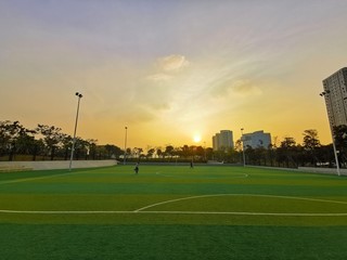 soccer field in a sunset scene