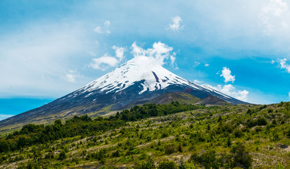 Snow capped volcano of Osorno and lush forest in Chilean Patagonia