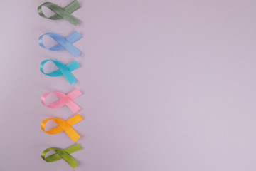 Different ribbons, symbols of cancer, cancer awareness month.  Copy space for your text.