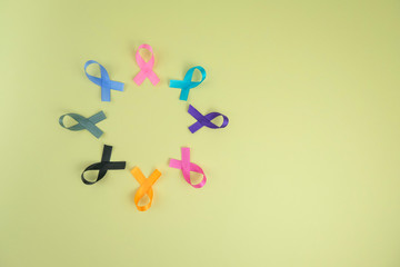 Different ribbons, symbols of cancer, cancer awareness month.  Copy space for your text.