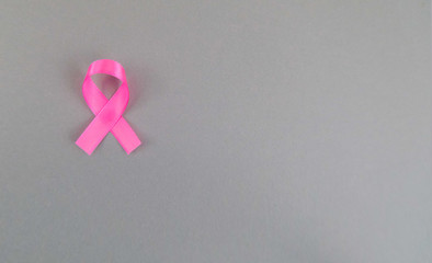 Pink ribbon, symbol of breast cancer, cancer awareness month.