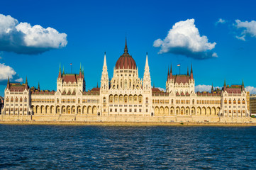 Obraz premium Budapest, Hungary - CIRCA 2013: Hungarian Parliament Building, as photographed from across the Danube; at a bright sunny summer day.
