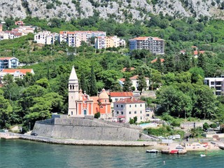 Beautiful ocean and mountain views along the coast of Kotor Bay in Montenegro - 325917279