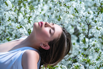 Beauty girl feeling spring. Spring sunny day.