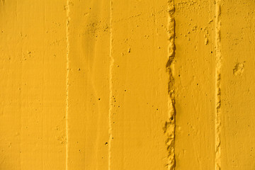 Yellow concrete wall.