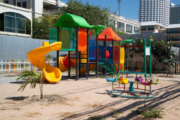 Large red and white playground for children in the city center , Children playground with outdoor...