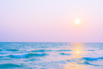 Fototapeta premium Beautiful tropical nature of sea beach ocean at sunset or sunrise time