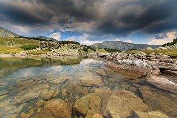 Gorgeous scenery in the Alps in summer, with a beautiful glacier lake