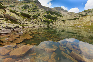 Gorgeous scenery in the Alps in summer, with a beautiful glacier lake