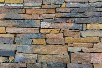 The stone wall texture background natural color.Background of stone wall texture photo.Natural stone wall texture for background.Old Brick texture, Grunge brick wall background.