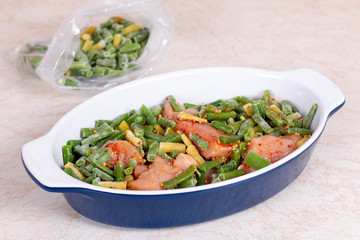Green beans and chicken in a baking dish