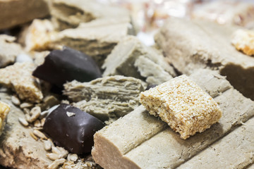 background of halva, kozinaki and sherbet. Oriental sweets on the counter in a store or Oriental Bazaar